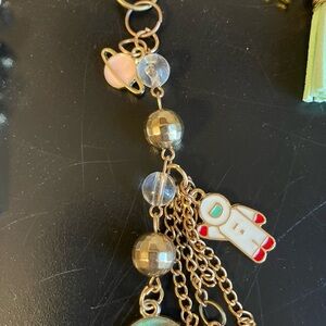 Gold beaded and Pink Planet w Astronaut Charm Keychain
